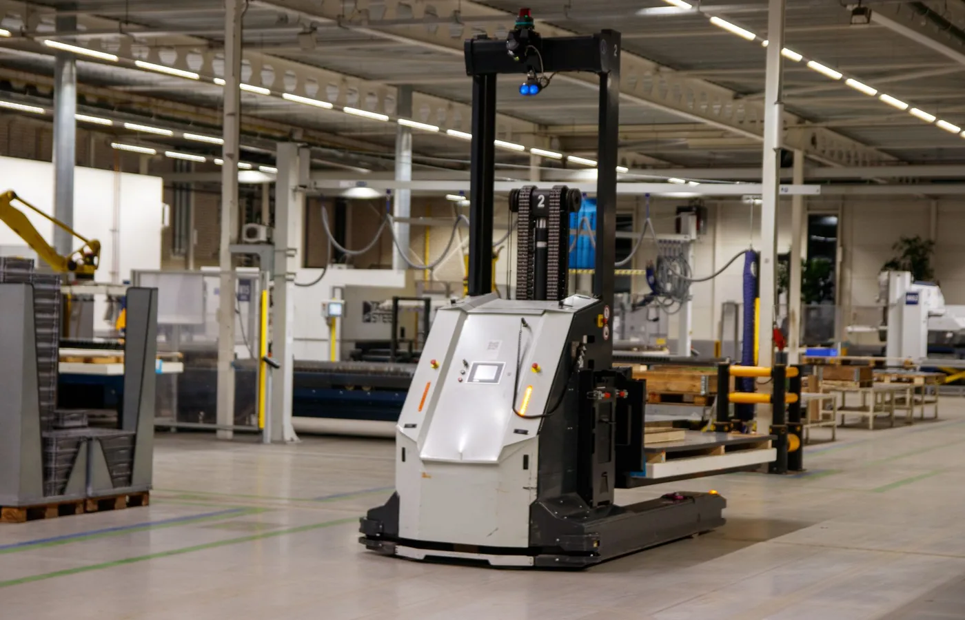 Autonomous industrial vehicle on an automated factory floor